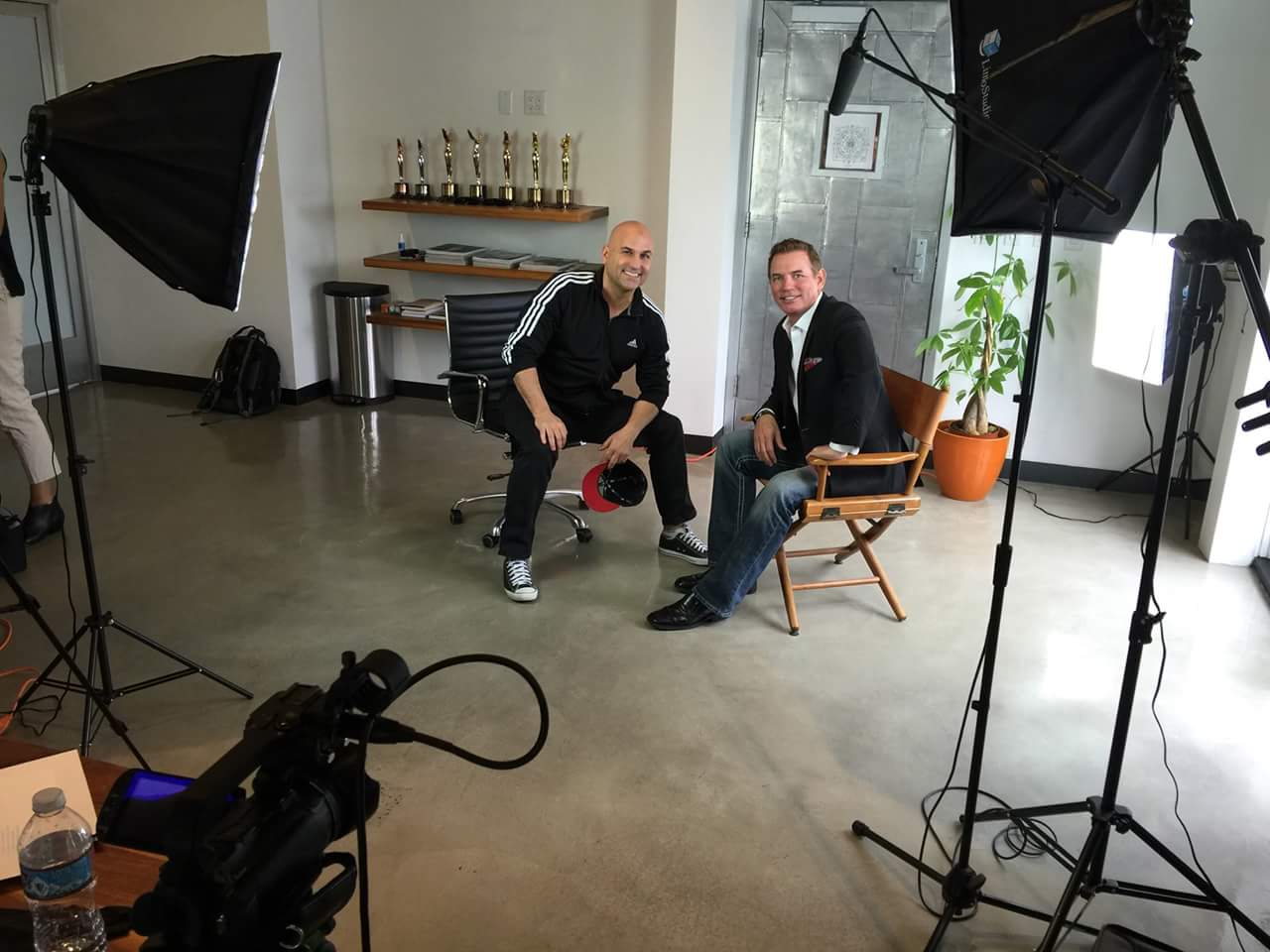 Mike Warren behind the scenes at a media interview